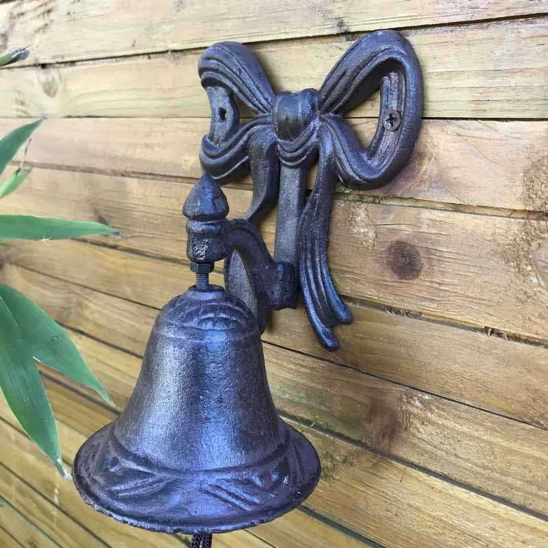 Deurbel voor tuinpoort met gietijzeren strikmotief