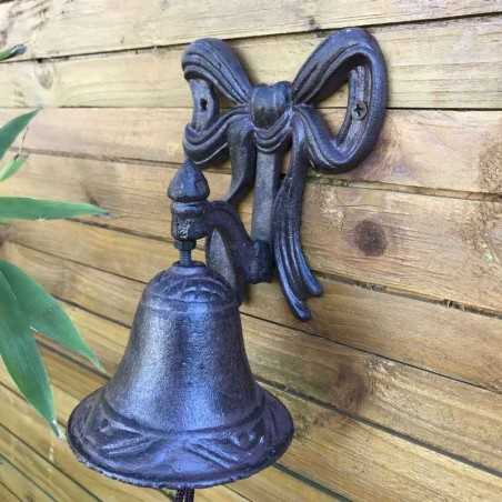 Deurbel voor tuinpoort met gietijzeren strikmotief