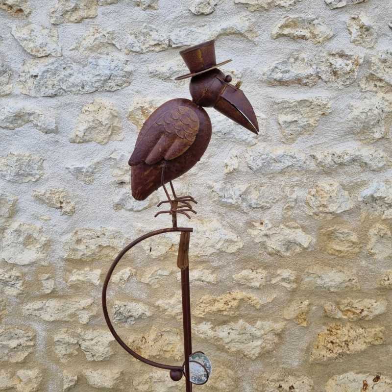 Tuinmobiel van smeedijzer met schommelarm en kraaienmotief, plantbare steunstang, perfect in balans