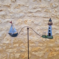 Balansgewicht vuurtoren en boot