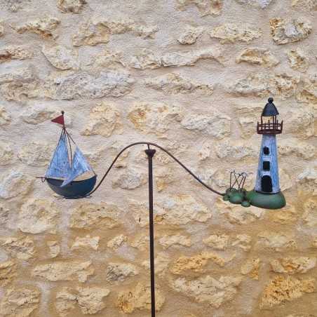 Balansgewicht vuurtoren en boot