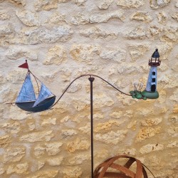 Balansgewicht vuurtoren en boot