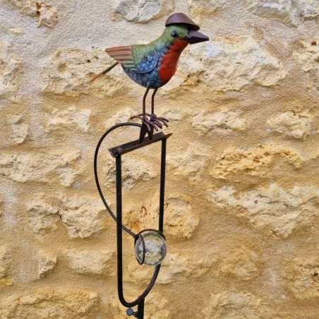 Balansgewicht, metalen en glazen vogelstok met hoed