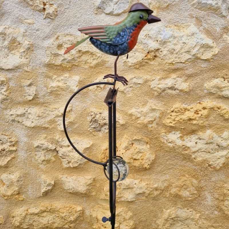 Balansgewicht, metalen en glazen vogelstok met hoed