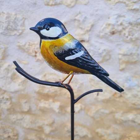 Decoratieve vogel op gele pin